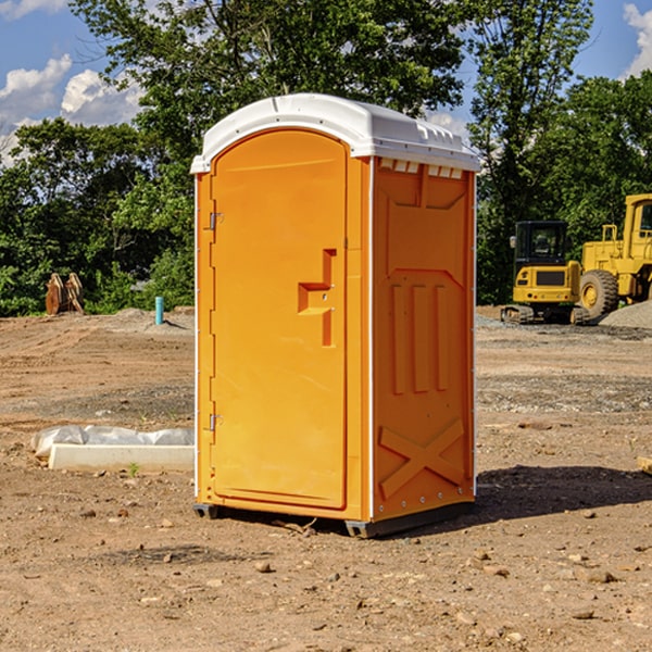 how often are the portable restrooms cleaned and serviced during a rental period in Wann